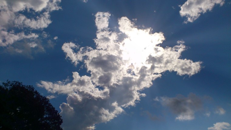 Sun behind Cloud